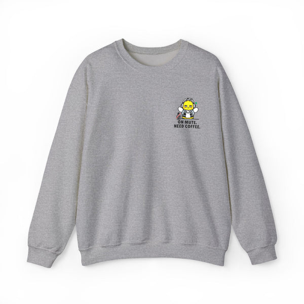Flat lay product mockup of a heather ash grey crewneck sweatshirt against a clean white background, showcasing a funny office humor bee mascot that says "On Mute. Need Coffee." on the left chest.
