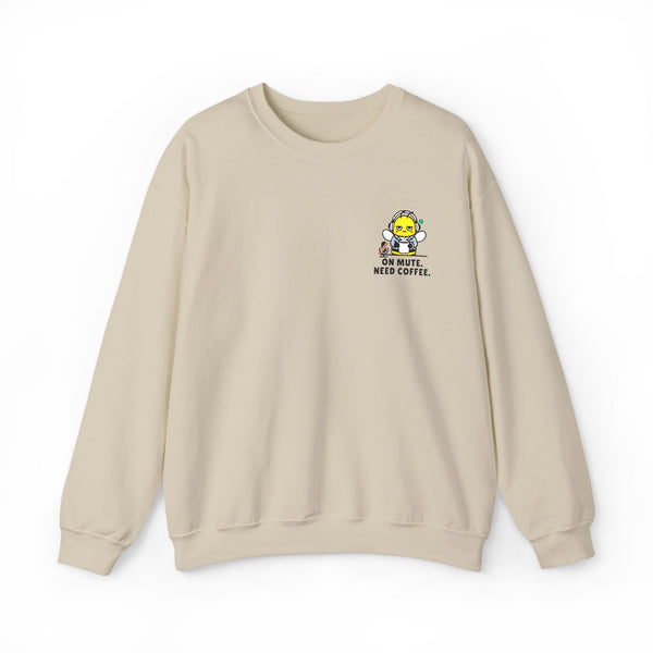 Flat lay product mockup of an oatmeal cream crewneck sweatshirt against a clean white background, showcasing a funny office humor bee mascot that says "On Mute. Need Coffee." on the left chest.
