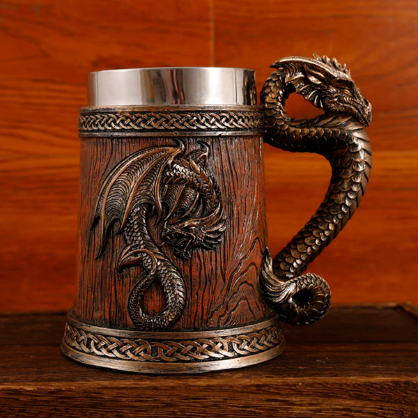 Front view of the classic bronze medieval dragon barrel tankard variant featuring a dark reddish-brown wood grain resin body and a detailed bronze dragon emblem with a sculpted tail handle.