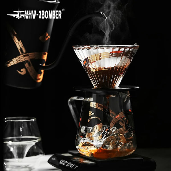 MHW-3BOMBER Serpent Series manual brewing setup featuring the glass coffee server, matching V60 dripper, and gooseneck kettle.