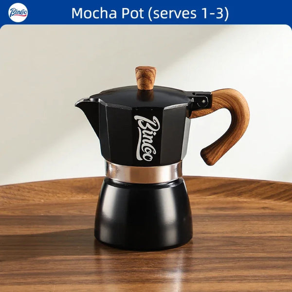 Black mocha pot with wooden handle and lid on a wooden surface, branded 'Bincoo'.