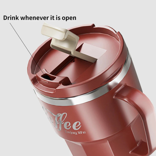 Close up of a red thermal coffee mug showing an open flip top lid for easy drinking