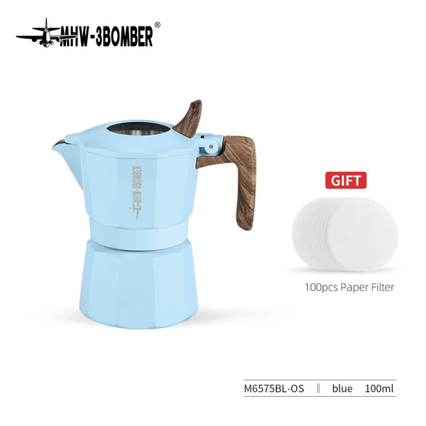 Blue coffee maker with wooden handle and paper filter on a white background, featuring MHW 3BOMBER branding.