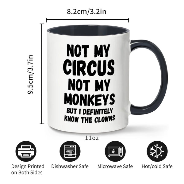 White mug with black interior and handle, featuring text 'Not my circus, not my monkeys, but I definitely know the clowns'. Dimensions and safety features are displayed.
