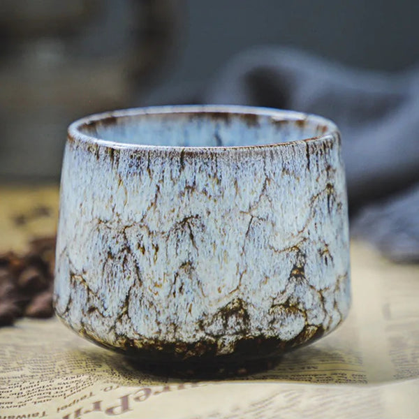 Alabaster White minimalist ceramic espresso mug showing a natural frost-white drip pattern.