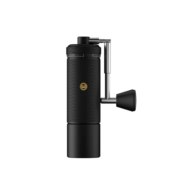 TIMEMORE Chestnut S3 Manual Coffee Grinder in Matte Black, showcasing its textured black aluminum unibody design, external camera-lens style grind adjustment ring with numerical dial markings, and a silver metal foldable crank handle with a matching black knob on a plain white background.