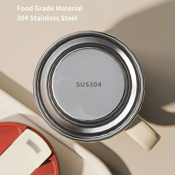 Top down view of food grade 304 stainless steel interior of an insulated coffee mug stamped with SUS304