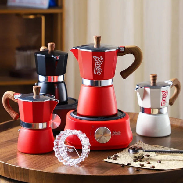 Collection of red and white Bincoo coffee makers on a wooden surface.