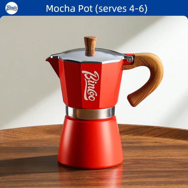 Red mocha pot with wooden handle and lid on a wooden surface, branded 'Bimcoo'.